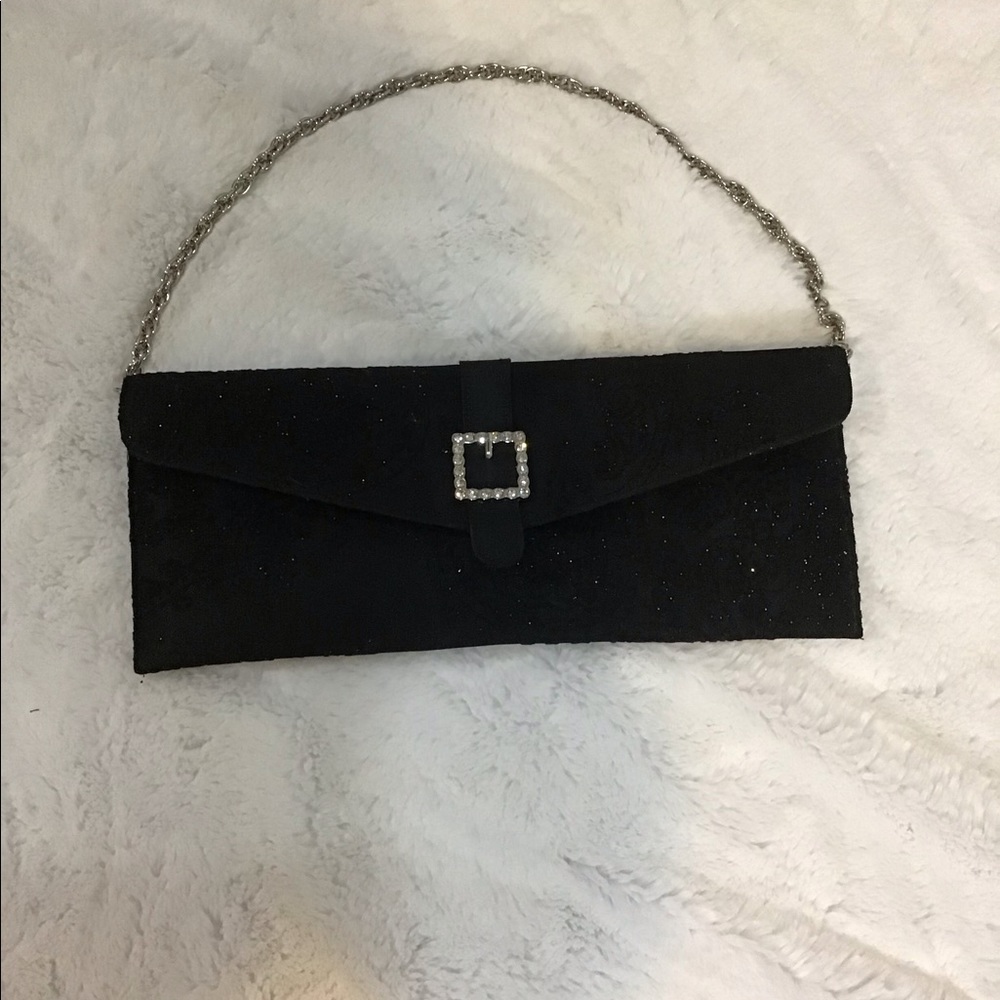 Black clutch purse with silver accent 👛